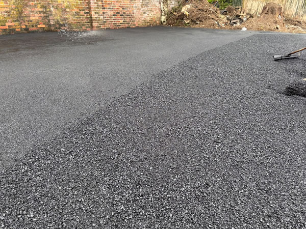 Close-up of a professionally finished asphalt and tarmac surface